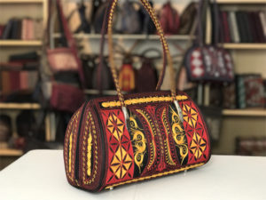 sehat handmade handbag in black red and yellow embroidery by Laga