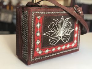 Tenang handmade bag in brown red and cream embroidery by Laga