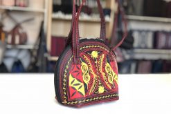 pagi small handmade handbag in black red yellow